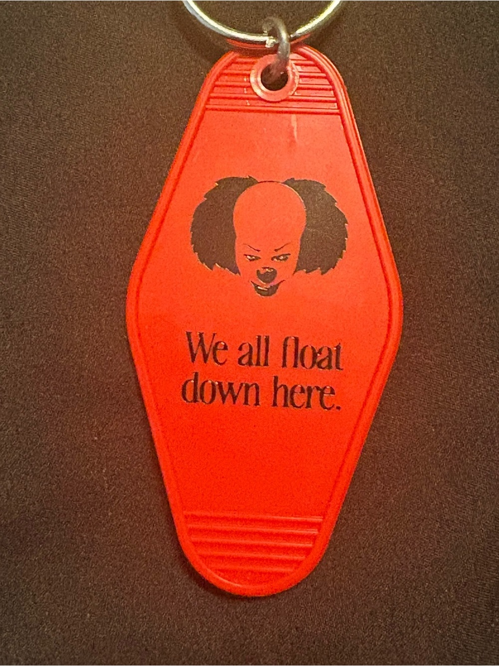 Red Horror-Themed Keychain Tag - "We All Float Down Here"